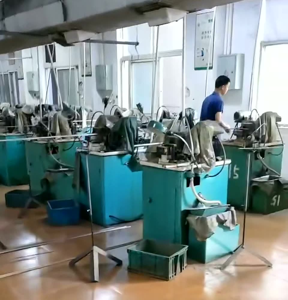 Bench machining stations on the Longxing workshop floor in Taizhou